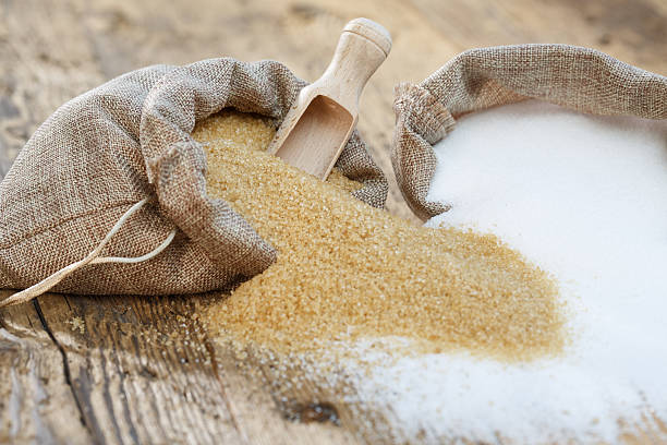 Various types of sugar, brown sugar and white. Small depth of field